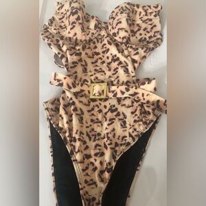 NWT. One piece swimsuit. Size S/P. NWT. WE WORE WHAT.